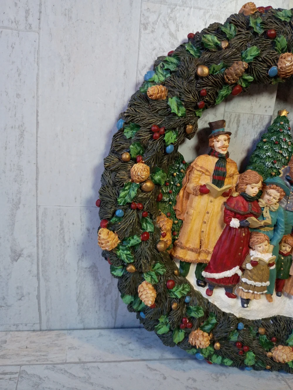 Resin wreath with vintage Christmas carols: traditional Christmas decoration